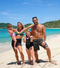Karstan and Maxine along with their kids on the beach
